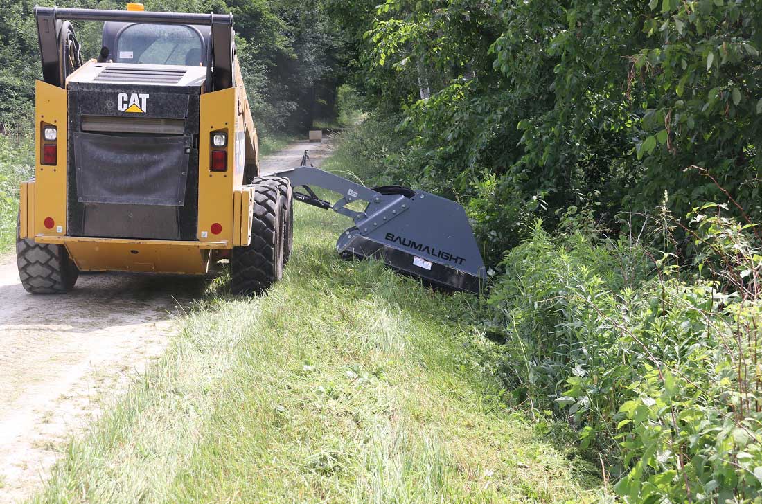 Trail maintenance with boom mower