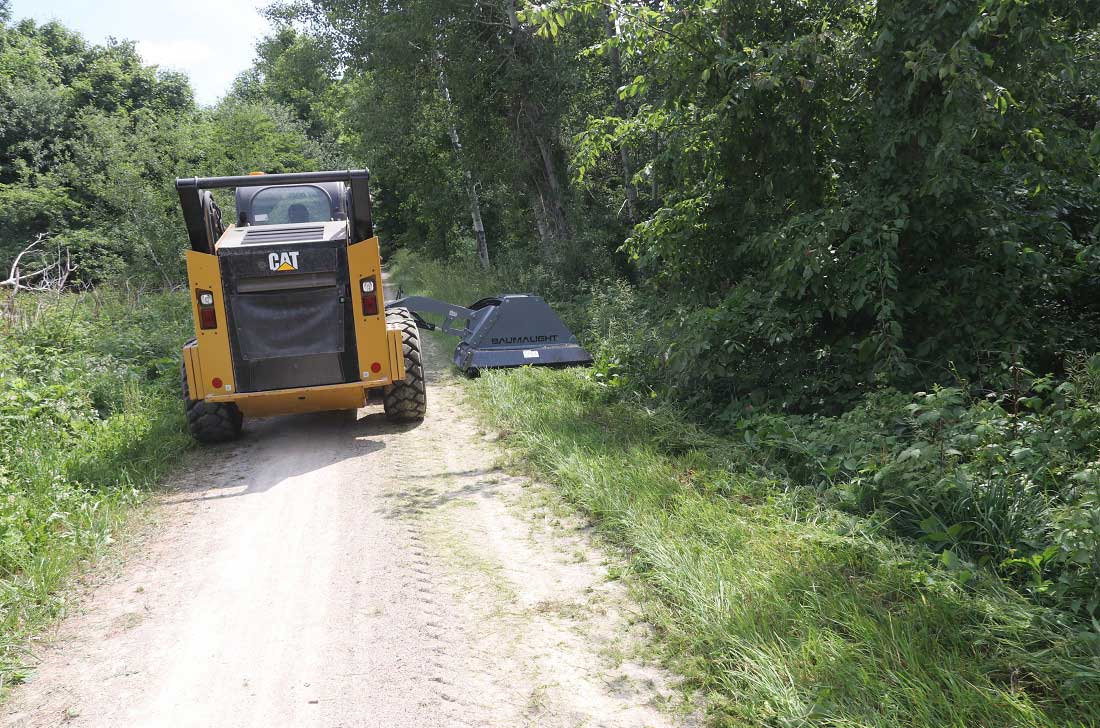 Trail maintenance with skidsteer