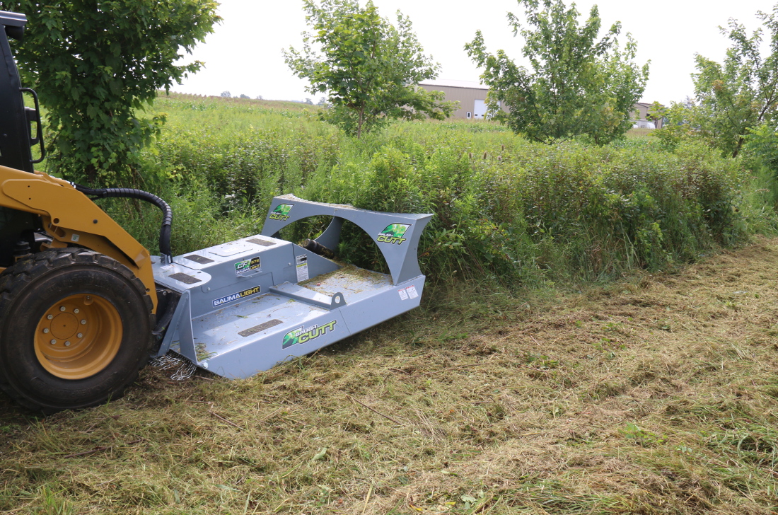 CF572 rotary cutter mowing heavy grass