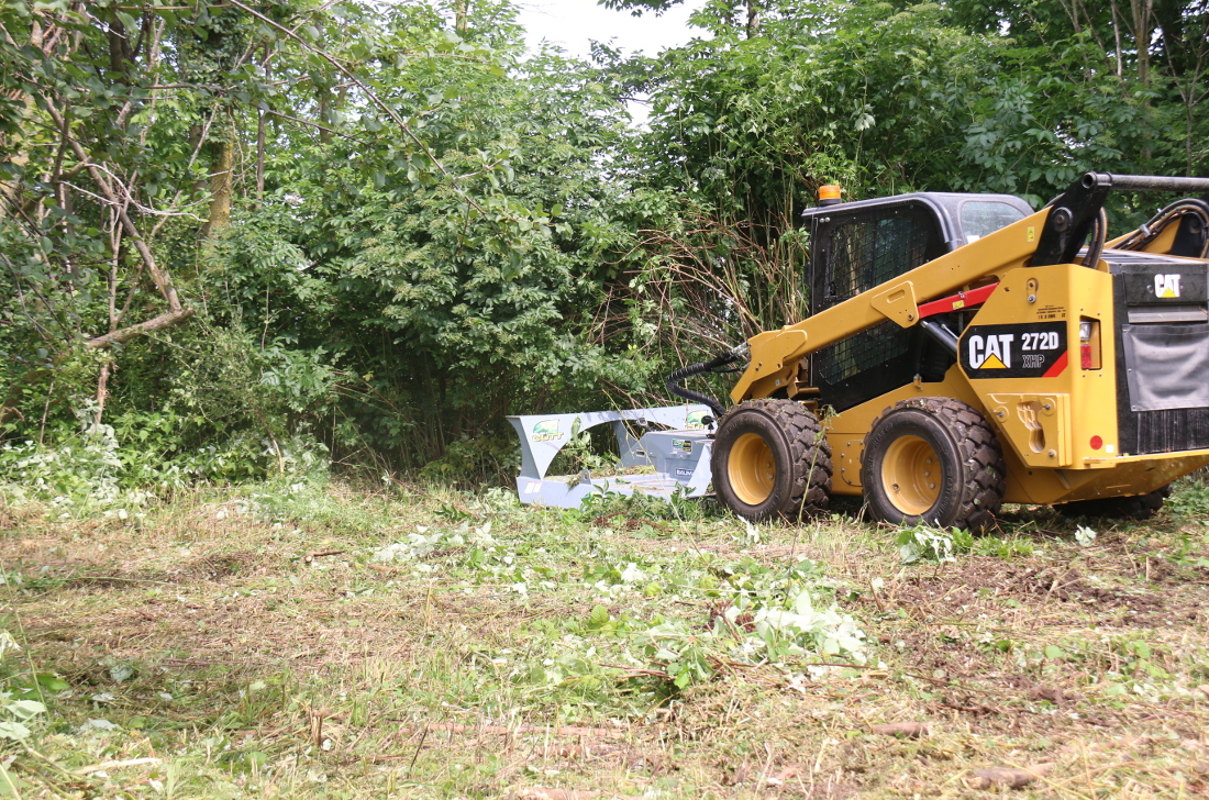 Land clearing with Baumalight rotary cutter