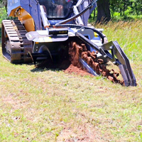 Trencher with armoured and sleeved hoses
