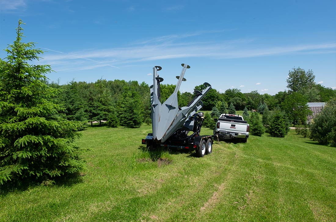 Réglage latéral du positionnement de la bêche à arbre